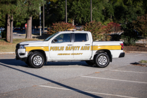 Henrico County Public Safety Aide pick-up truck in a parking lot with trees in the background.